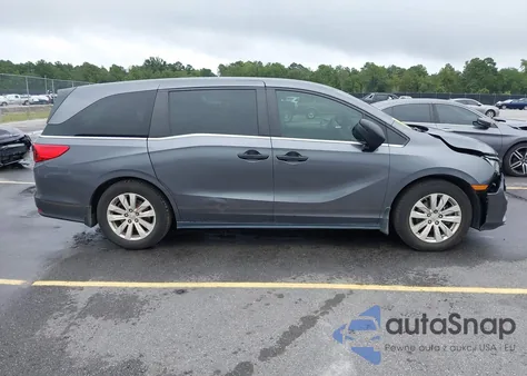 2018 Honda Odyssey Lx z USA, uszkodzony, nr VIN 5FNRL6H21JB034782